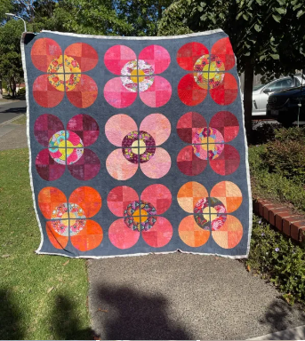 Modern Blossom Quilt Pattern by Free Bird Quilting Designs